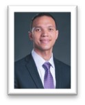 headshot of man in suit