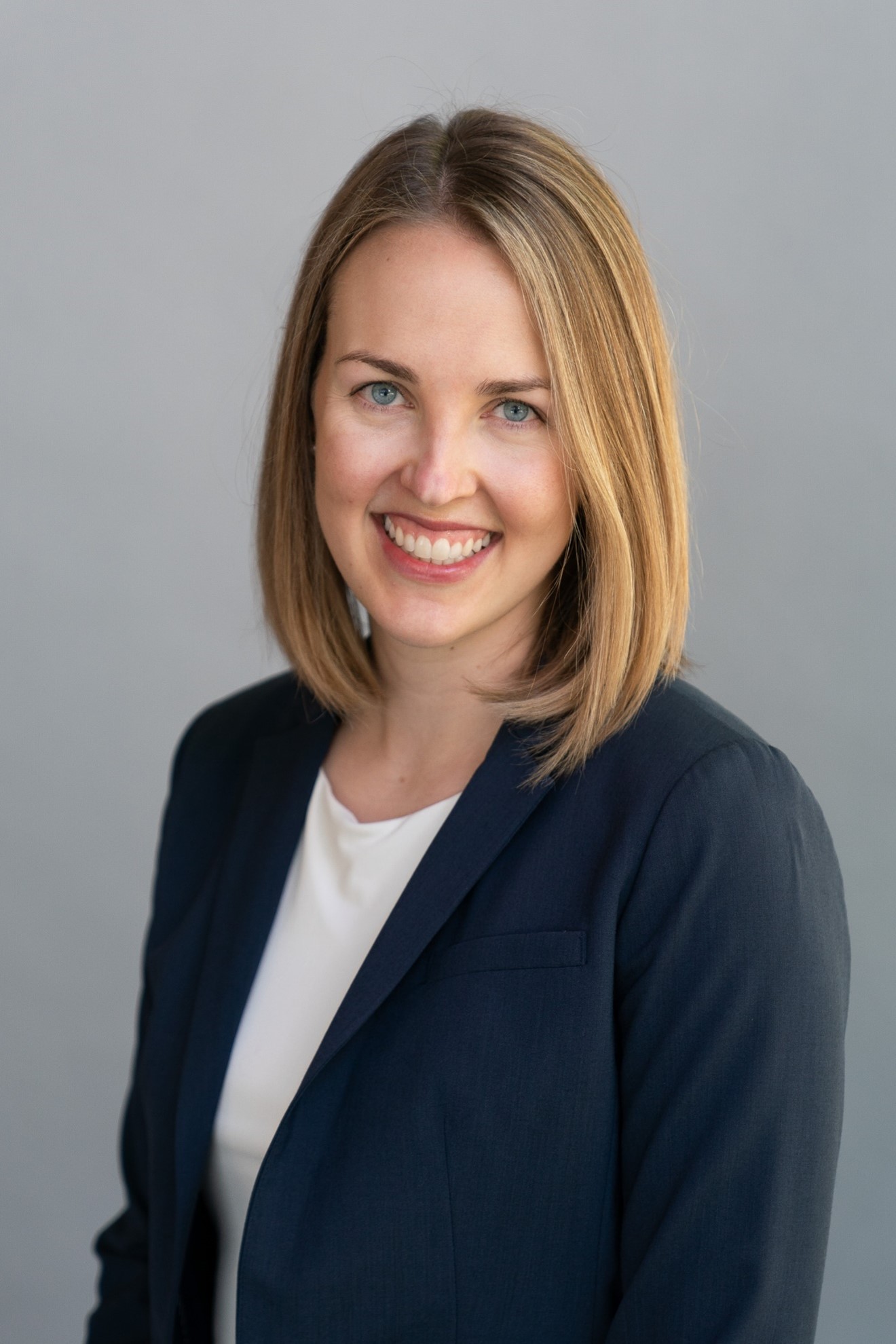 headshot of women in suit