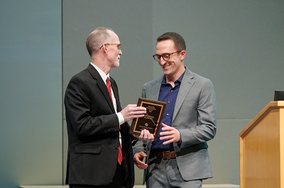 Matthew Pomeroy Receiving Award