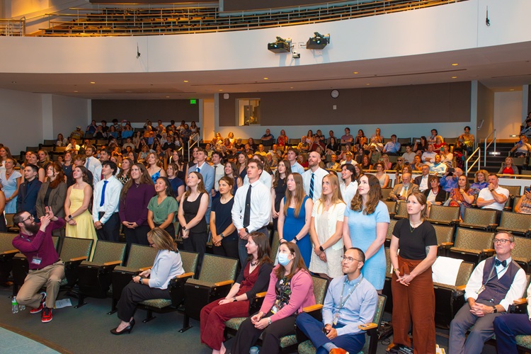 Students reciting the oath at the Class of 2028 White Coat and Oath Ceremony.