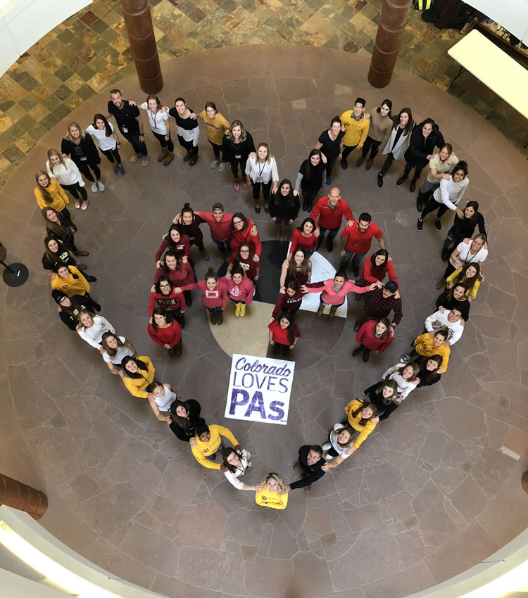 Bird's-eye view of students forming the shape of a heart around the letters 'PA'