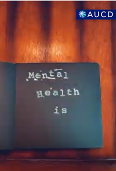 A black book with white stamped words Mental Health is
